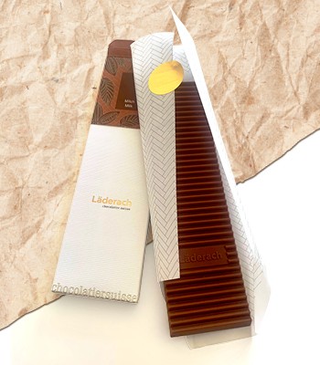 Umweltbewusste Hüllen für köstliche Schokoladentafeln​ wie diese Läderach Schokoladenverpackung